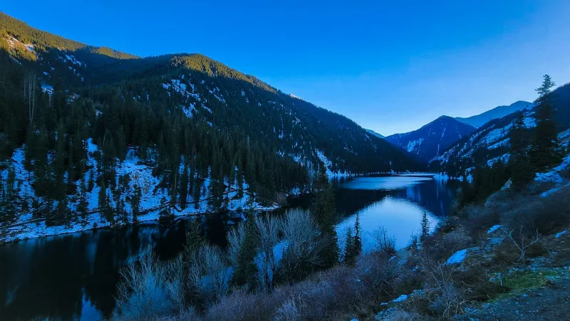 Snowy mountain lake in Kazakhstan